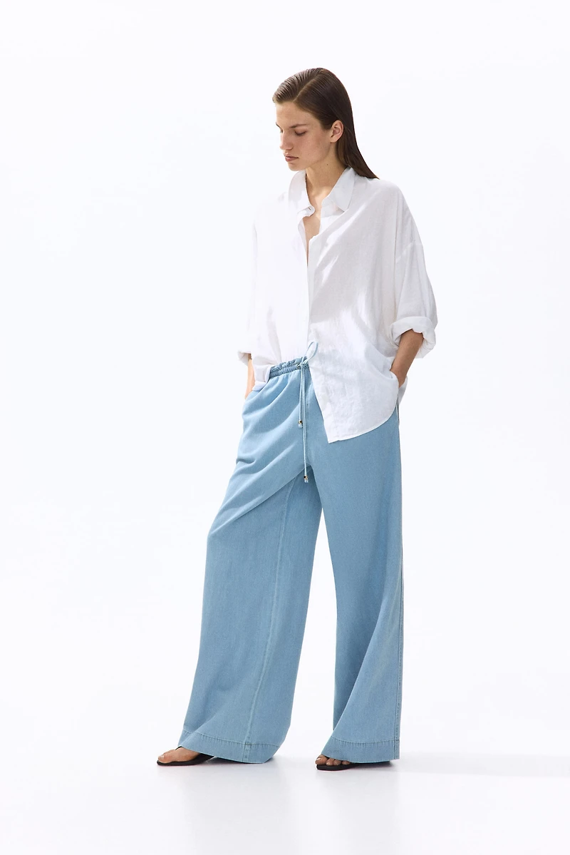 Pantalon taille froncée à jambes larges