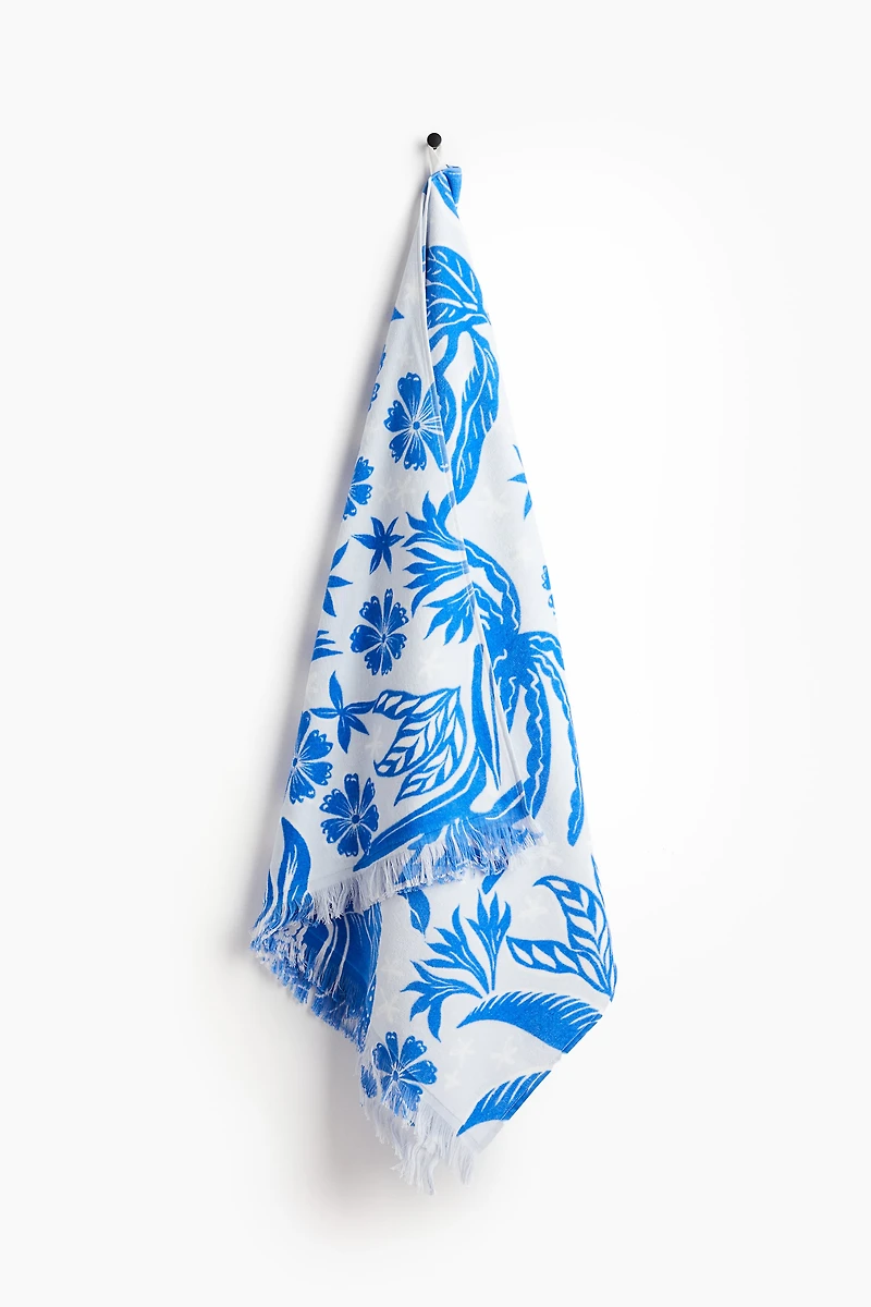 Serviette de plage à motif