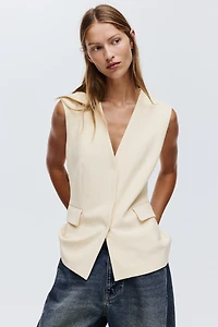 Long chandail sans manches