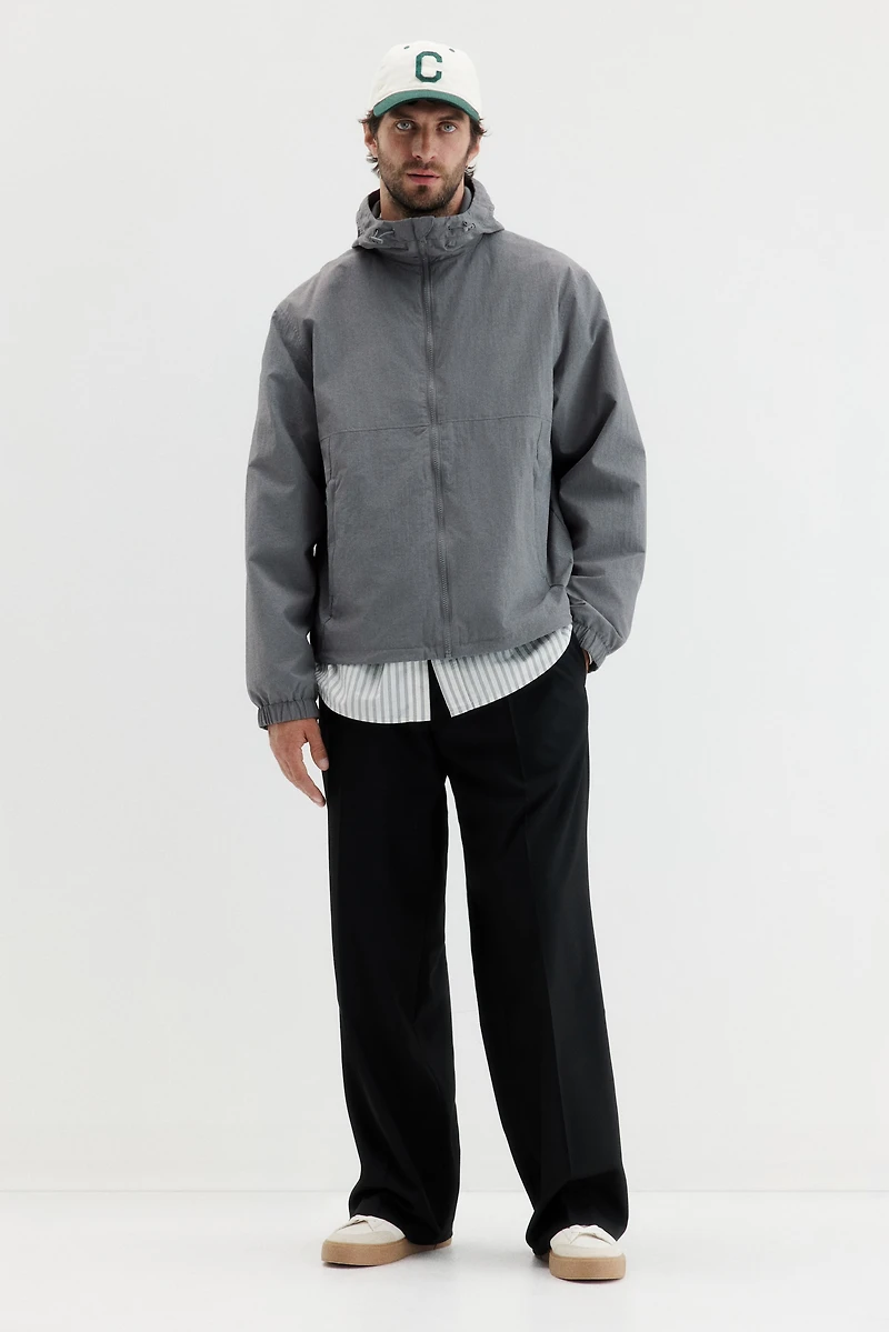 Veste coupe-vent à capuche