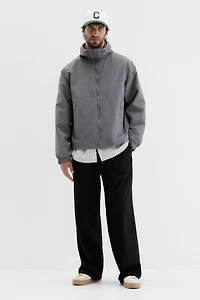 Veste coupe-vent à capuche