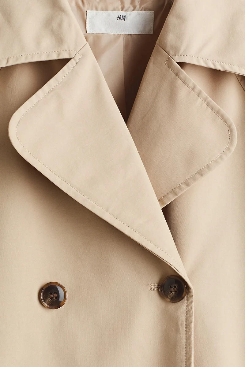 Trench à fermeture croisée