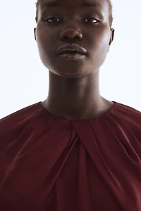 Blouse en satin avec manches ballon