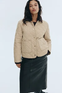 Veste matelassée avec col en velours côtelé