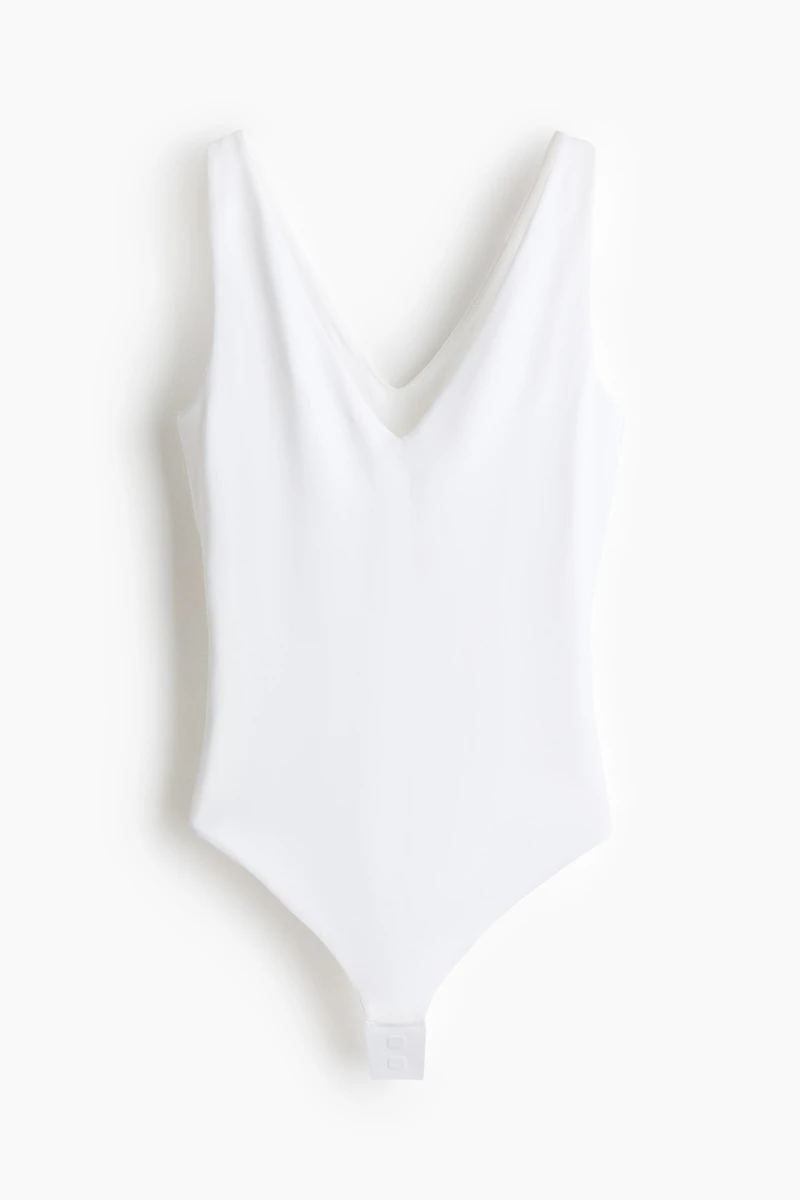 Maillot string sculptant sans manches