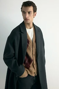 Manteau à fermeture droite en laine mélangée