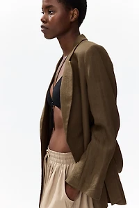 Veston en tissu texturé avec ceinture à nouer