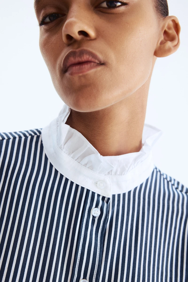 Blouse à col volanté