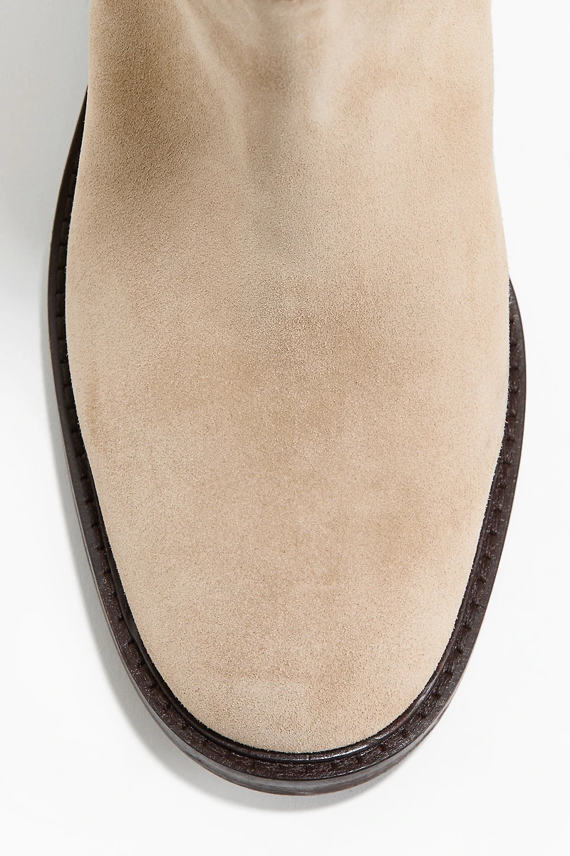 Bottes au genou en cuir velours fendu