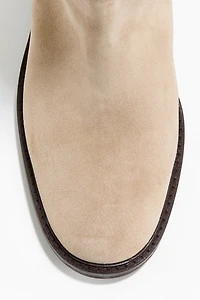 Bottes au genou en cuir velours fendu