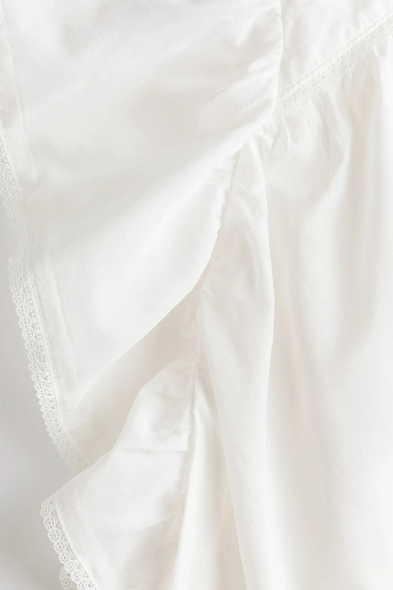Blouse à manches volantées avec dentelle