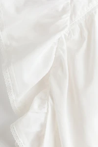 Blouse à manches volantées avec dentelle