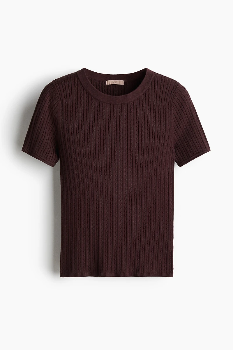 Haut en tricot torsadé