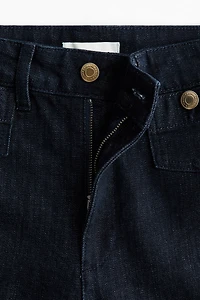 Jean large à la cheville taille haute