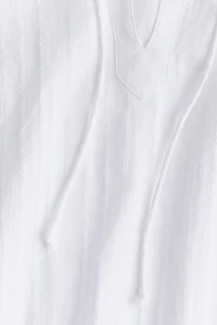 Blouse en coton avec détails à nouer