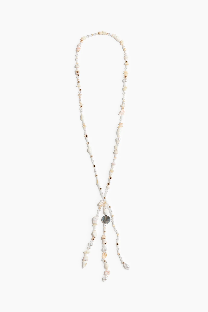 Collier avec perles fantaisie