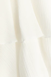 Robe asymétrique à volant