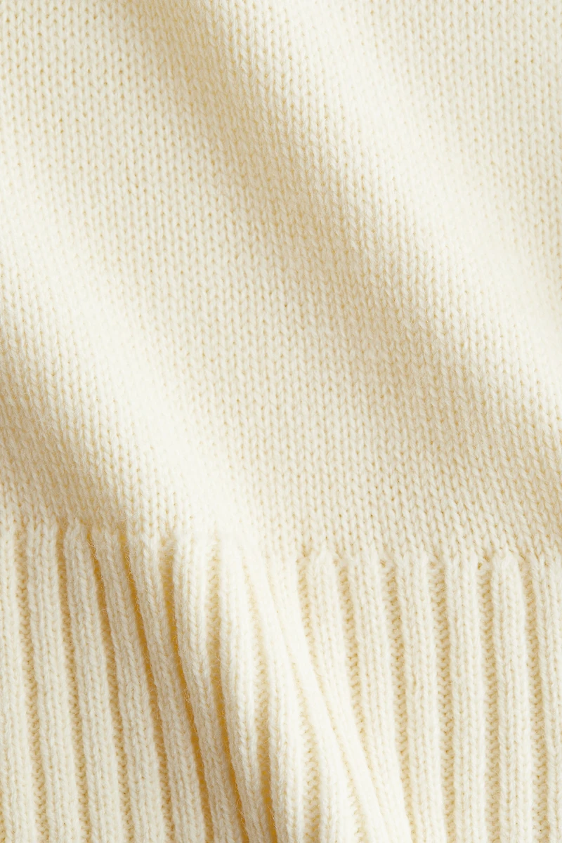 Chandail à col roulé en fin tricot doux