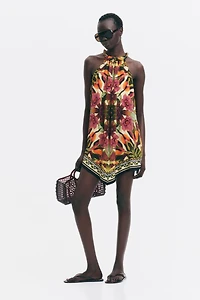 Robe à motif avec bas en pointe