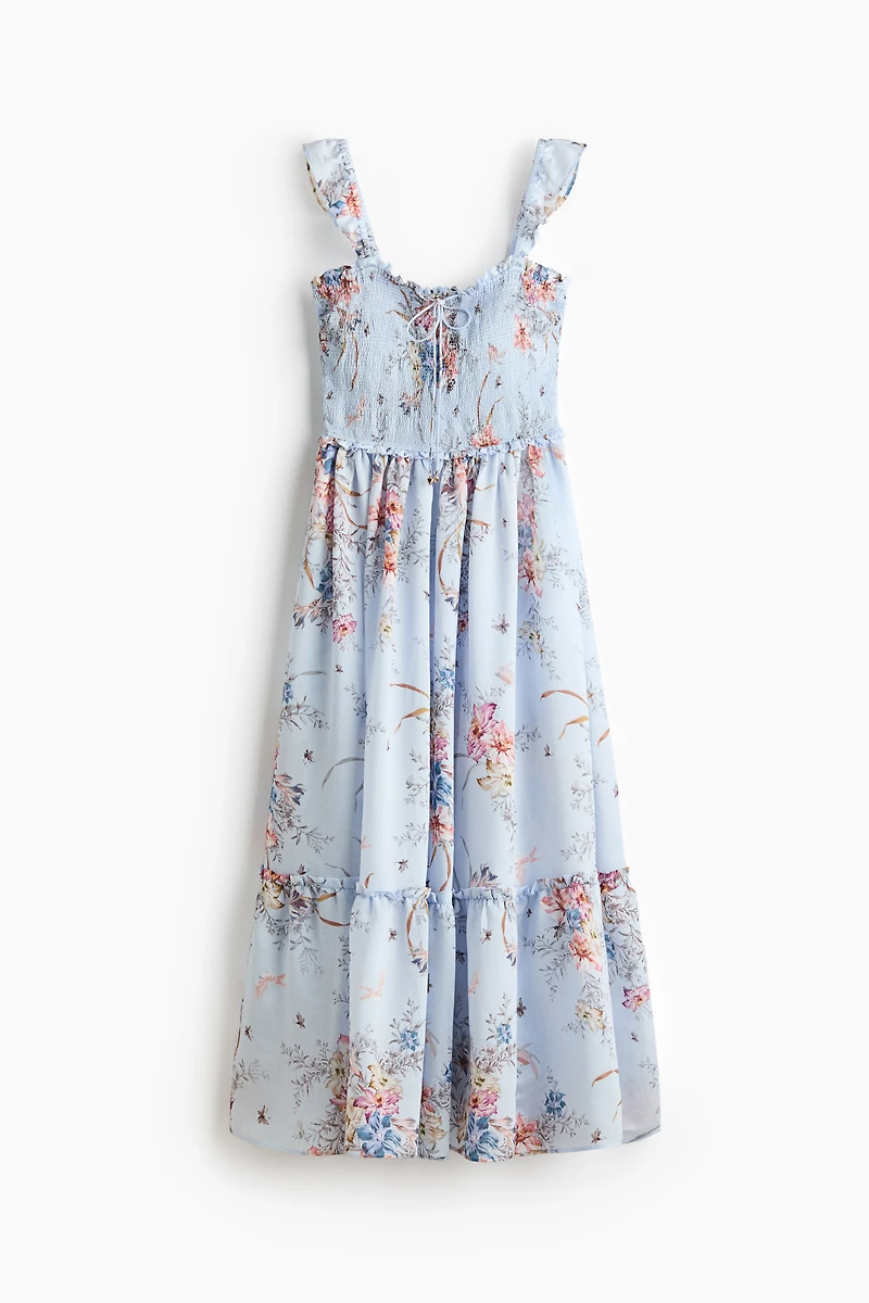 Robe volantée à corsage nid d'abeille