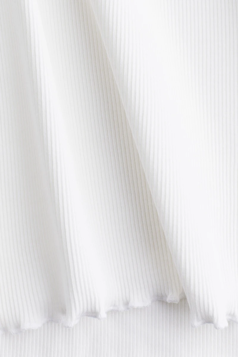 T-shirt avec détails surjetés