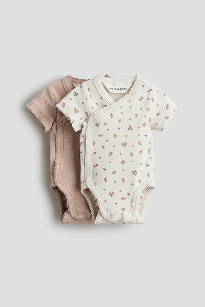 Lot de 2 cache-couches côtelés à fermeture croisée