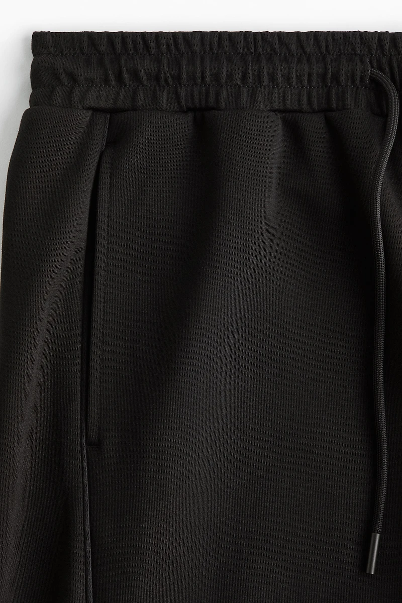 Loose-Fit Sports Shorts with DryMove™