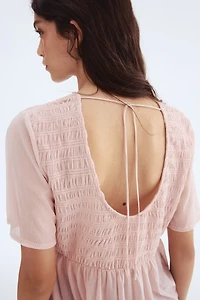 Smocked Peplum Top