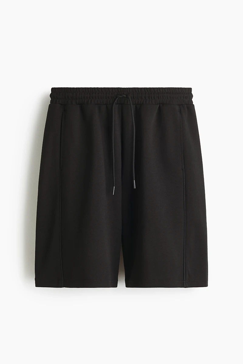 Loose-Fit Sports Shorts with DryMove™