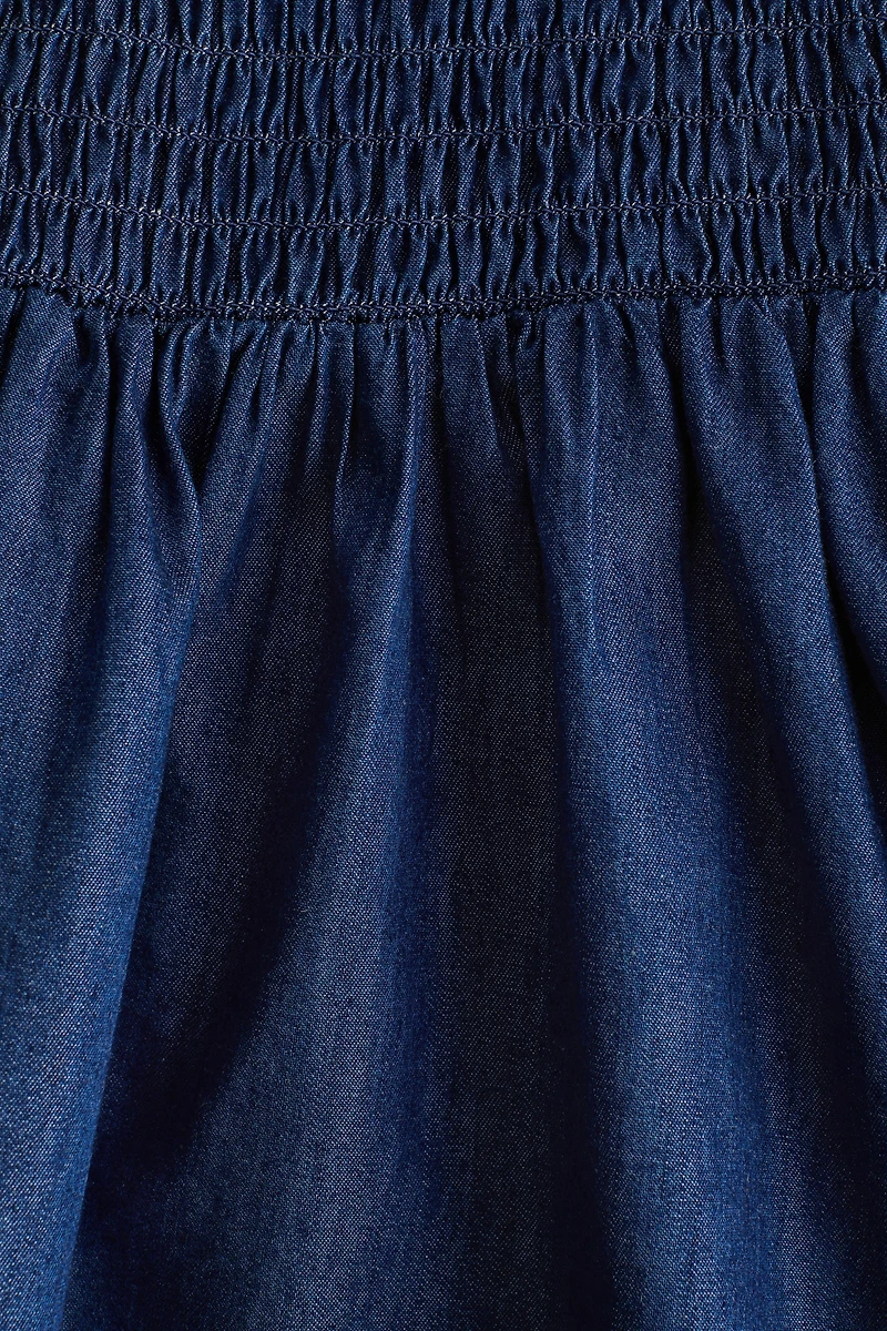 Robe smockée en denim