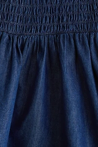 Robe smockée en denim