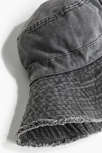 Chapeau en coton à bord frangé