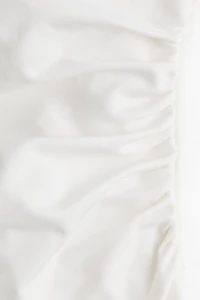 Haut asymétrique