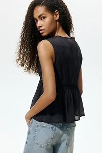 Lace-Trimmed Peplum Top