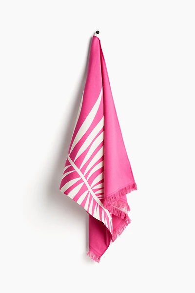 Serviette de plage frangée