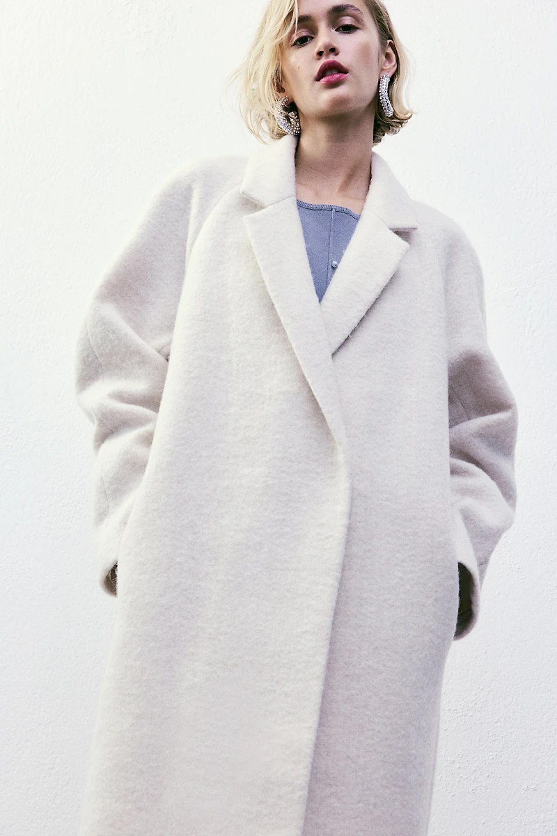 Manteau à fermeture croisée