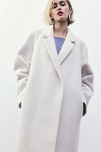 Manteau à fermeture croisée