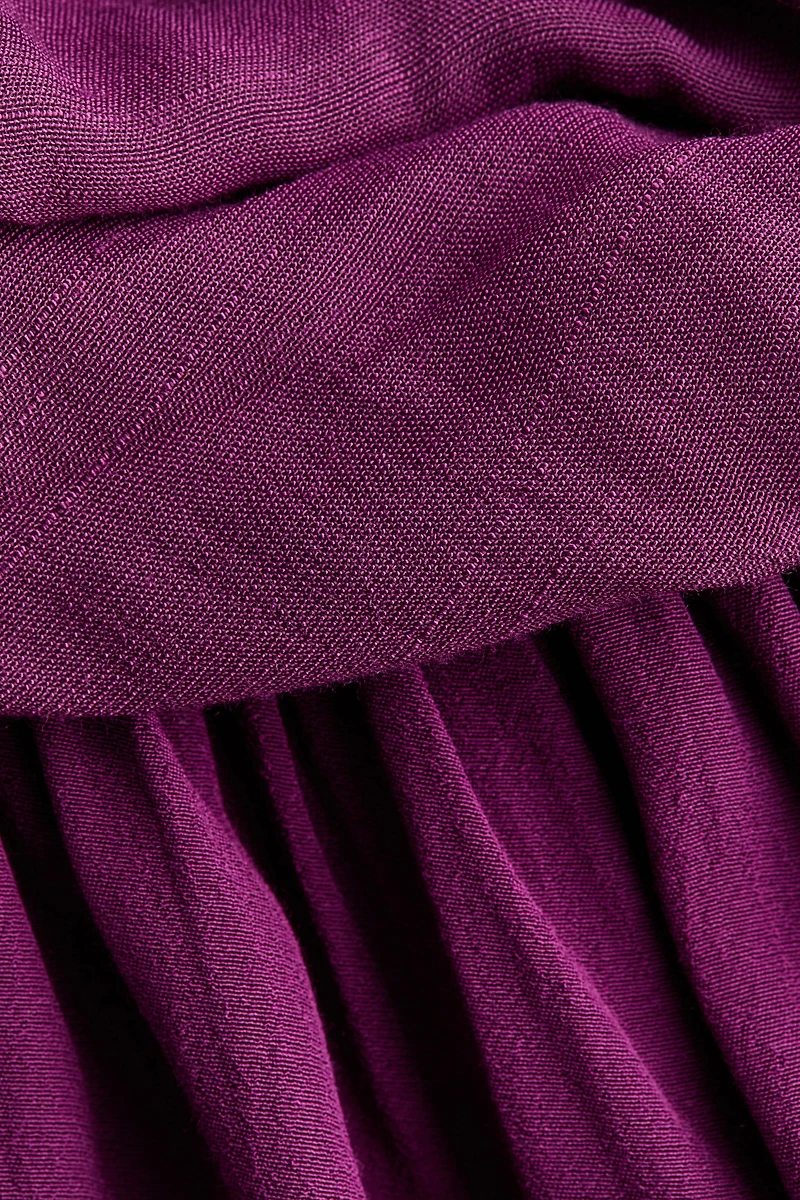 Robe asymétrique à dos nu