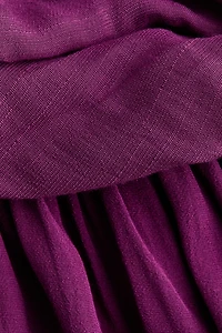 Robe asymétrique à dos nu