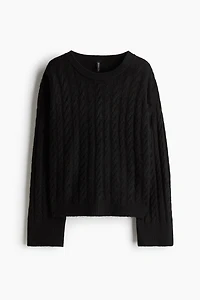 Chandail en tricot torsadé