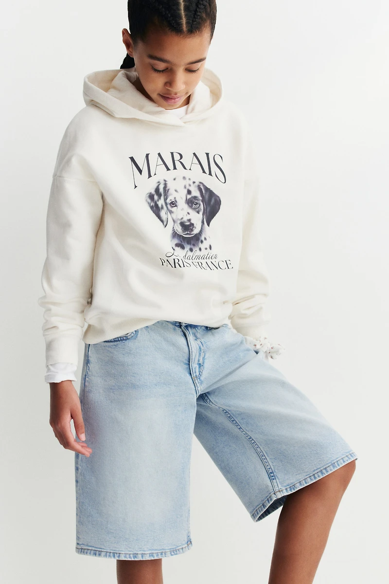 Short taille basse en denim aux jambes larges