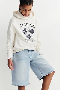 Short taille basse en denim aux jambes larges