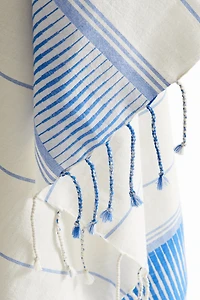 Serviette de plage en tissu jacquard