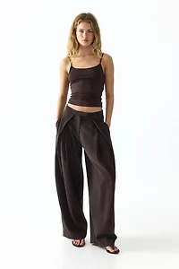 Pantalon à jambes ballon avec détails croisés