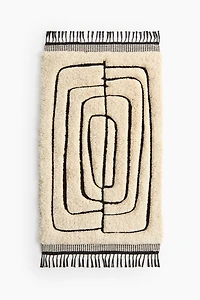 Tapis à franges en laine mélangée