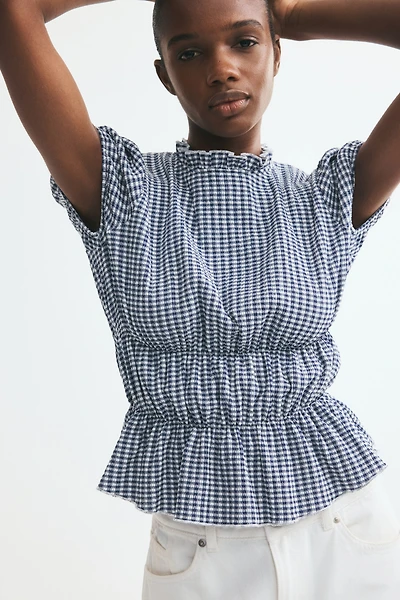 Blouse à manches bouffantes