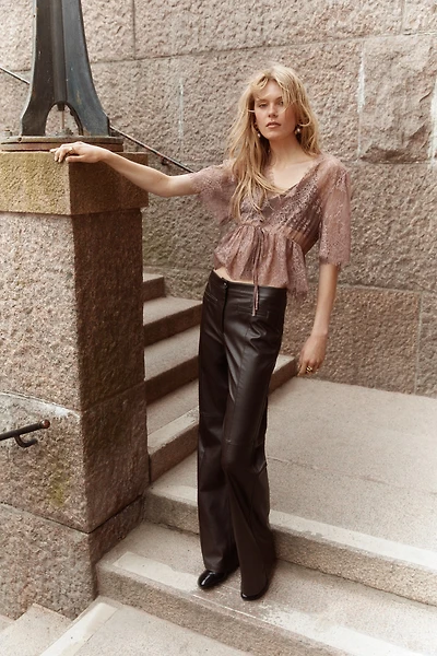 Pantalon en tissu enduit