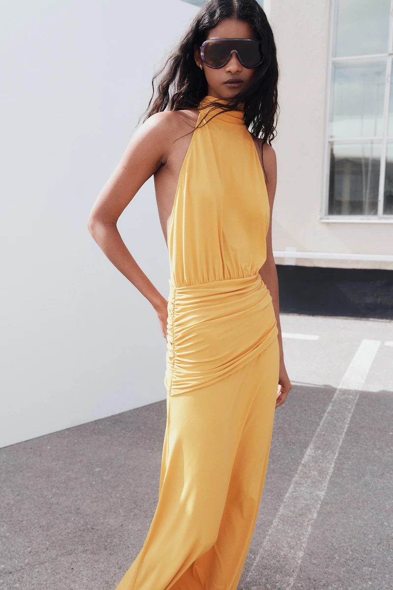 Robe dos nu à effet drapé