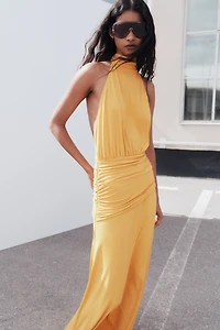 Robe dos nu à effet drapé
