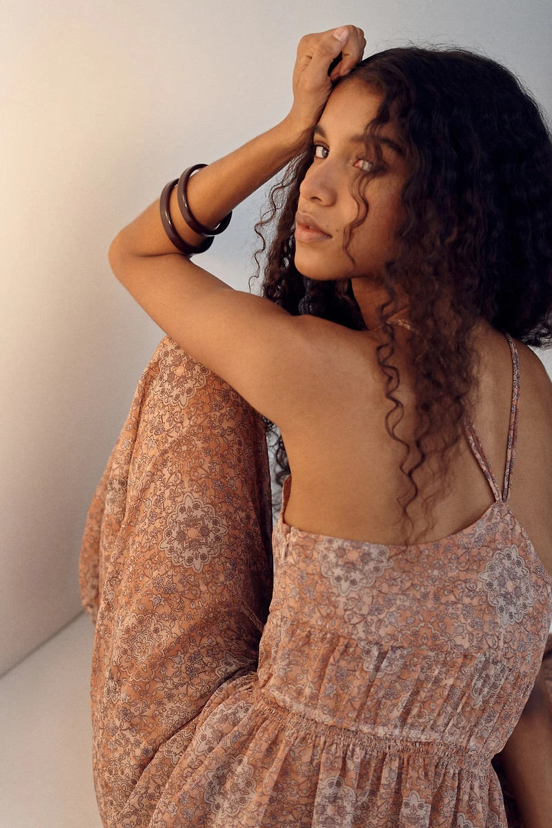 Haut péplum à bretelles fines